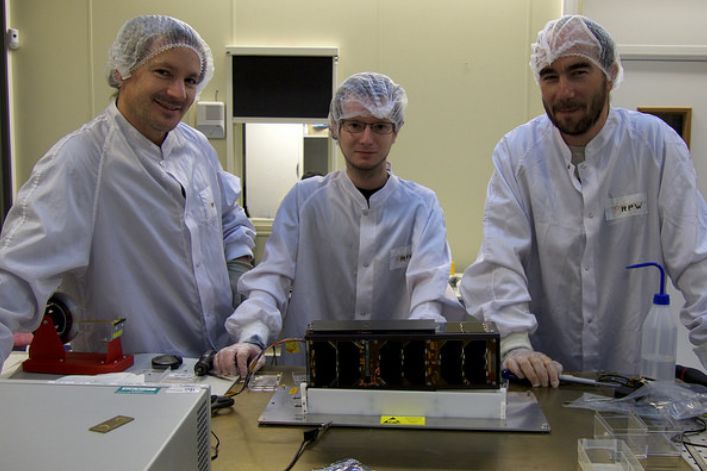 7 December 2017, Paris Observatory - Meudon, France: After a long night of work, PicSat is fully integrated. Vincent Lapeyrere (left), Lester David (middle), Sylvestre Lacour (right), . © PiCSat team