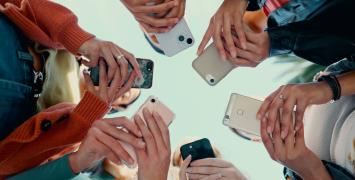 people holding mobile phones